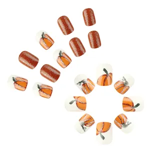 24pcs Thanksgiving press-on nails featuring pumpkin art and glittery reddish-brown finish