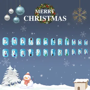 Blue Christmas press-on nails set featuring 24 pieces with glitter snowman and snowflakes