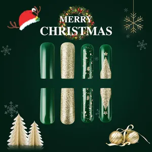 Glossy Christmas press-on nails with dark green glitter and golden star tree design