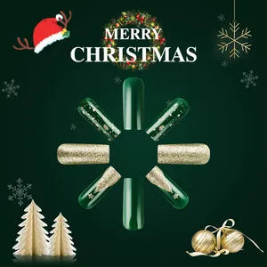 Detail of Christmas press-on nails featuring green glossy, glitter and snowflake patterns