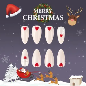 Christmas press-on nails set with red hearts and silver reindeer antlers on white base