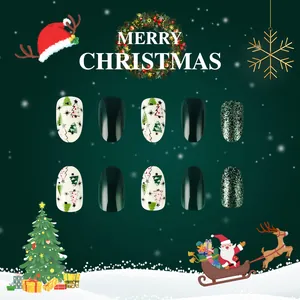 Christmas glossy short press-on nails featuring green glitter and festive tree patterns