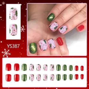 Short square Christmas press-on nails set featuring red, green glitter and tree patterns