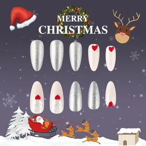 Short glossy Christmas press-on nails with silver glitter, hearts, and reindeer designs
