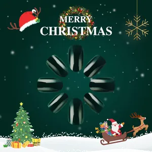 Deep green glossy short fake nails arranged in a circle for Christmas nail art set