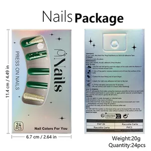 Detailed view of dark green Christmas press-on nails set with glitter trees and tools
