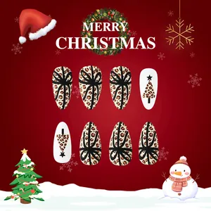 Short matte leopard print press-on nails with Christmas tree and bow designs