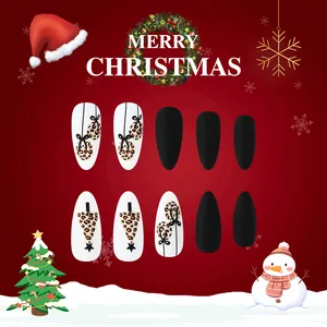 Detail of matte leopard print Christmas press-on nails with festive tree and bell designs