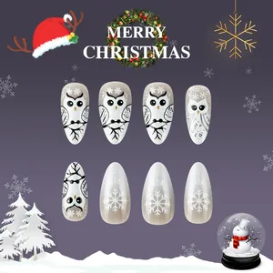 Short almond Christmas fake nails set with owl and snowflake festive nail art designs