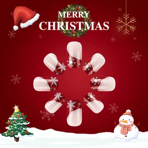 Faux ongles de Noël courts et carrés avec paillettes rouges et motifs de flocons blancs