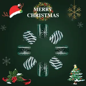 Christmas press-on nails with dark green glitter snowflakes and festive stripe patterns