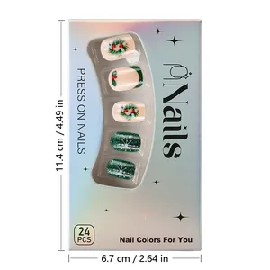 Christmas press-on nails set with holly berries and snowflakes pattern on glittery base