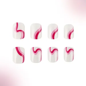 Short square press-on nails with white base and pink wavy line patterns