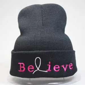 Detail of Believe pink embroidery with breast cancer awareness ribbon on black beanie