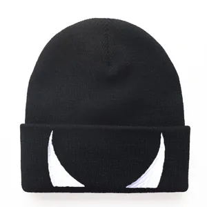 Black knitted beanie featuring white devil horn embroidery and folded brim design