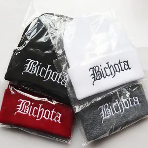 Winter knitted beanies with Bichota star embroidery in black, white, red, and grey colors