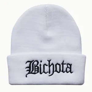White knit beanie with black Bichota embroidery in Gothic font for winter street style
