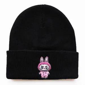Black knit beanie with pink cartoon rabbit embroidery on a classic fold-over cuff