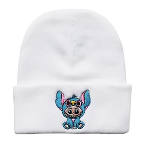 White knitted beanie for winter featuring cute cartoon stitch embroidery on the cuff