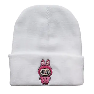 White knitted beanie with pink cartoon embroidery for autumn and winter 2025