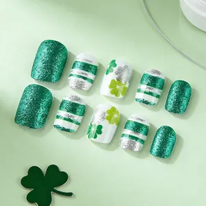 St. Patrick's Day green clover and glitter stripe press-on nails with shiny finish