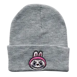 Grey knit beanie featuring a pink cartoon rabbit embroidery for outdoor winter warmth