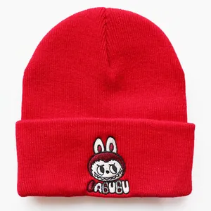 Cozy red knitted beanie hat featuring a cute Labubu cartoon character embroidery