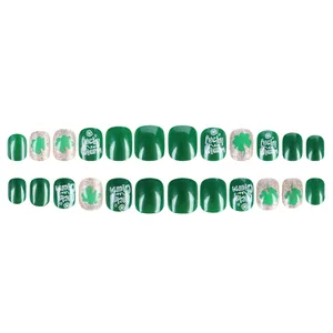 Saint Patrick's Day short square press-on nails with green clover and Lucky Charm text