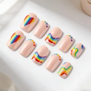 Short square press-on nails with rainbow heart stripes and glossy pink base