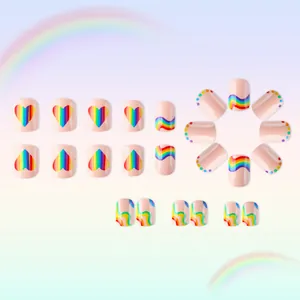 Detailed view of rainbow striped heart short press-on nails with 24-piece colorful set