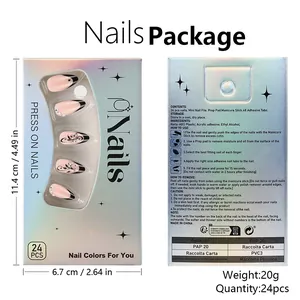 Press-on nail kit set with 24 pink almond nails with black French tips and floral gems