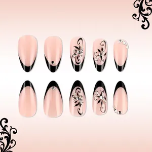 French black teardrop press-on nails with baroque vine patterns and rhinestones