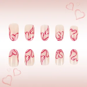 Short almond press-on nails with pink French tips and red heart line art designs