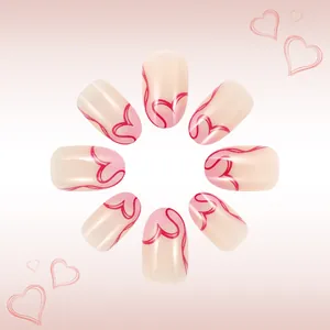 Short almond press-on nails featuring pink heart line art and glossy French finish