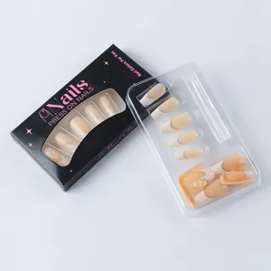 Detail of silver glitter French press-on nails in black gift packaging with tray