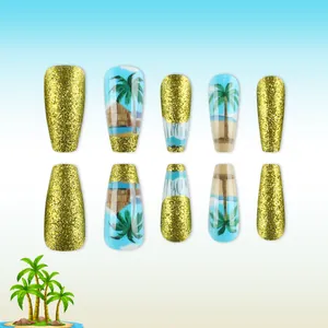 Tropical palm tree and gold glitter Y2K press-on nails with blue beach design in long coffin shape