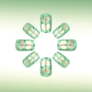 Square avocado green press-on nails with golden hearts and terrazzo spot pattern