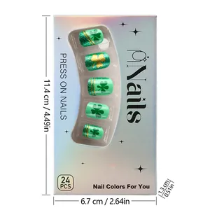 Detailed view of St. Patrick's Day press-on nail kit featuring glitter clover designs