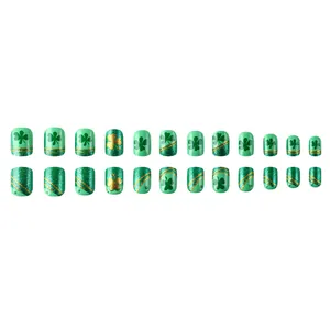 Short square St. Patrick's Day press-on toenails with green clovers and gold glitter