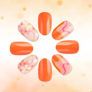 Detail of oval press-on nails with daisy flower patterns and gold glitter wave lines