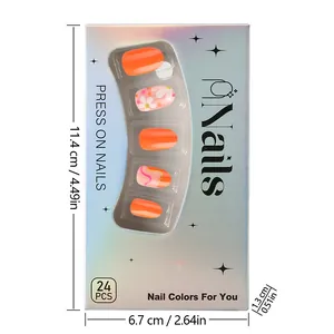 Detail of orange floral press-on nails with daisy patterns in laser holographic packaging