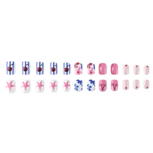 Short square press-on nails set featuring pink floral, cherry, and star patterns