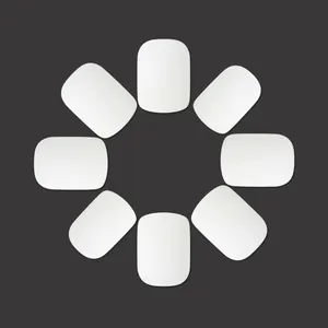 Minimalist matte white press-on nails set with rounded square shape on grey surface