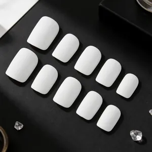 Short square matte white press-on nails set with minimalist design and 12 pieces