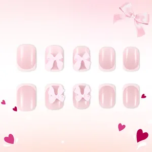 Unghie finte corte rosa stile French con fiocchi bianchi 3D in set da 10 pezzi