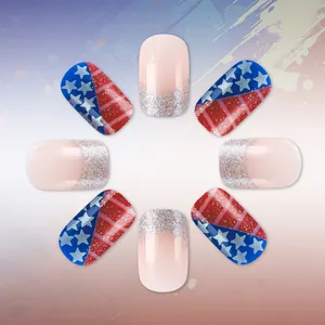 Detail of US flag themed press-on nails with silver glitter French tips and star patterns
