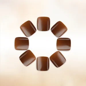 Glossy caramel brown press-on toenails with square shape on a neutral background