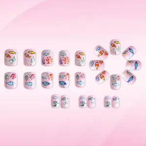 Detailed set of 24 pink ocean themed press-on nails with fish and coral patterns