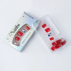 Short square press-on nails set with red, star patterns and wave stripes packaging