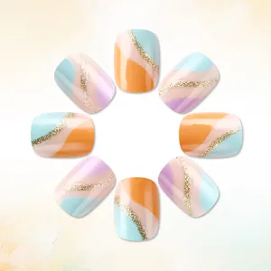 Detail view of macaron color press-on nails with glitter stripes and wavy patterns